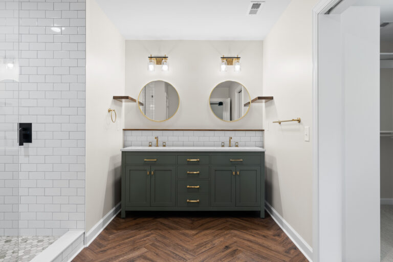 Fuqua-Varina Bathroom Addition Green Vanity Gold Mirrors